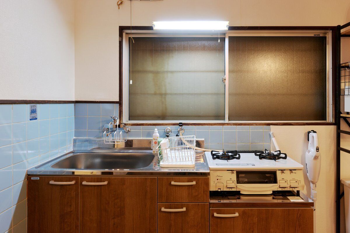 Fridge, microwave, cookware/dishes/utensils