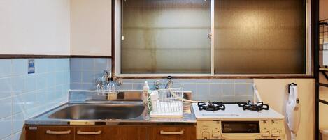 Fridge, microwave, cookware/dishes/utensils