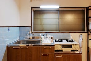 Fridge, microwave, cookware/dishes/utensils