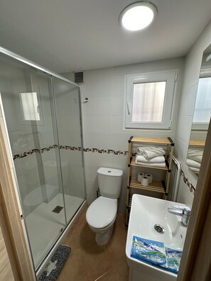 Hair dryer, towels, soap, toilet paper