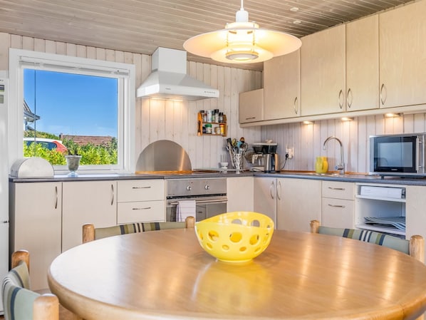 Fridge, microwave, cookware/dishes/utensils