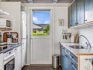 Fridge, microwave, cookware/dishes/utensils