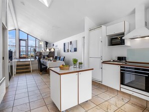 Fridge, microwave, dishwasher, cookware/dishes/utensils