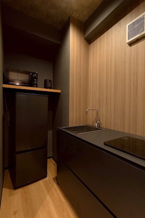 Chambre Triple, non-fumeur | Cuisine privée