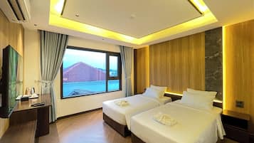 Deluxe Twin Room, 2 Bedrooms, Non Smoking | In-room safe, desk, blackout drapes, soundproofing