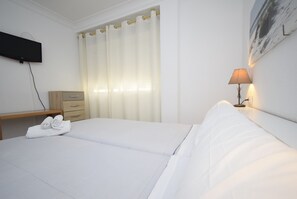 2 habitaciones, tabla de planchar con plancha y wifi gratis
