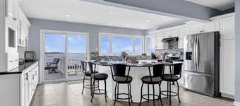 Waterfront Retreat with Dock, Firepit, and Bay Views | 4BR Pelican Island Oasis