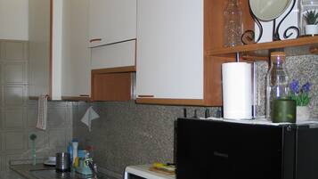 Een magnetron, een oven, een kookplaat