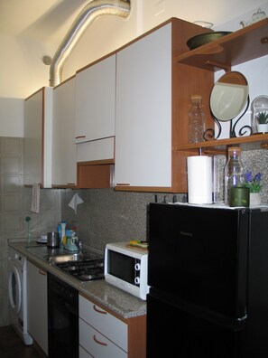 Mikrobølgeovn, ovn og kokeplater