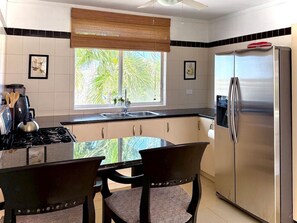 Fridge, oven, stovetop, coffee/tea maker