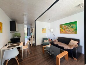 Living area - Modern See und Mehr Apartment 2 with covered terrace and garden view (Stetten)