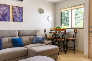 Living area - Cozy Condo with Panoramic Hillside Views from Rooftop Terrace and Short Walk to Beach (Coco)