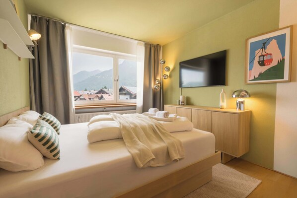 1 dormitori, un bressol de viatge, wifi i roba de llit 