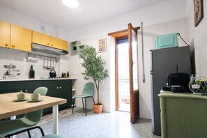 Fridge, microwave, coffee/tea maker, toaster