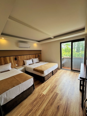Comfort Triple Room, City View | In-room safe, laptop workspace, free WiFi