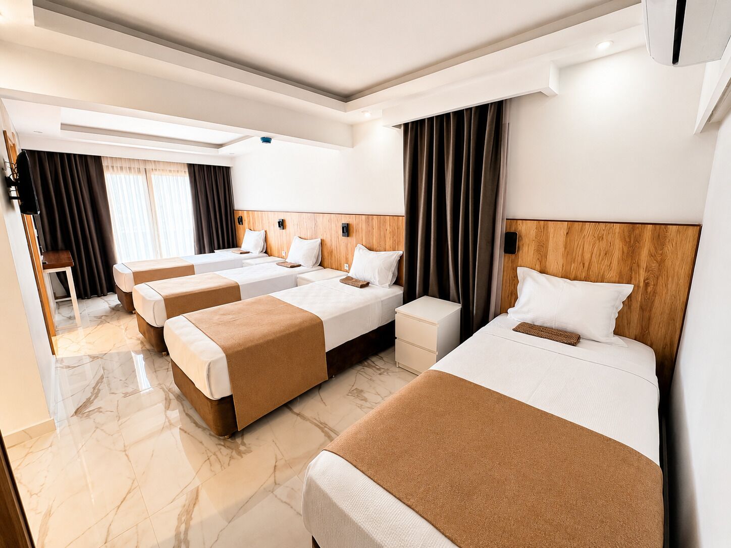 Comfort Quadruple Room | In-room safe, laptop workspace, free WiFi