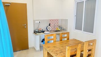 Deluxe Double Room, Kitchen | Private kitchen