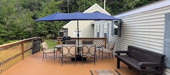 Secluded waterfront 2-bedroom / 2 bath on private 152 acre Sportsman's Pond.