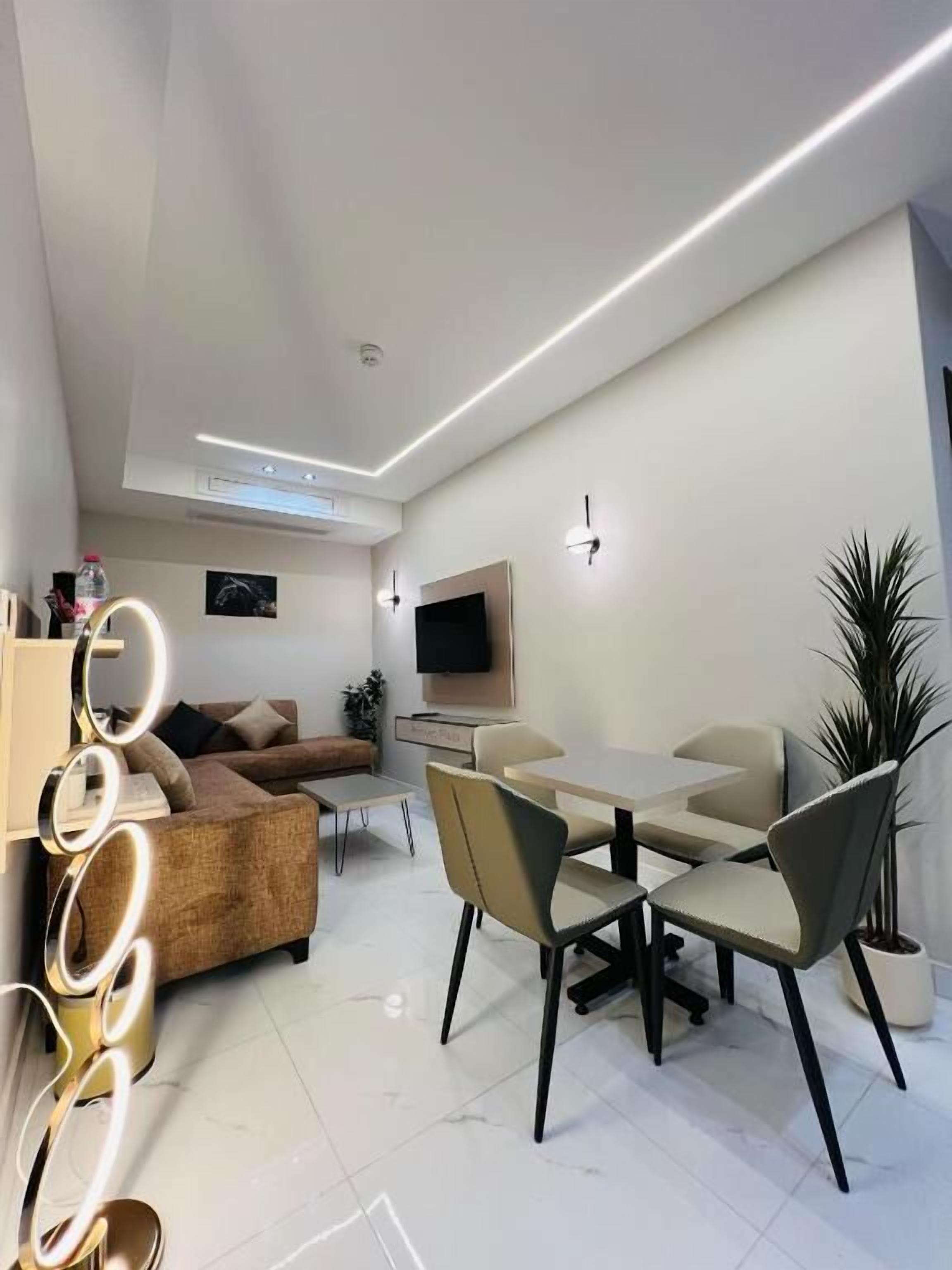 Luxury Suite, Courtyard View | Living area | Computer monitors, printers