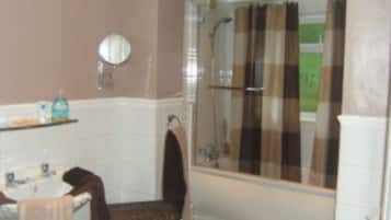 Shower, towels, soap, toilet paper