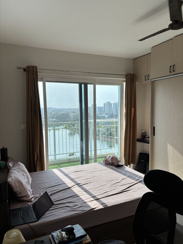 Cozy studio in pleasant Haralur with WiFi, AC and lake View