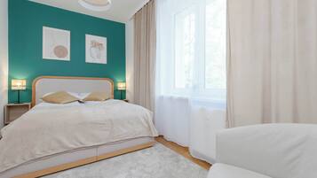 1 habitación, tabla de planchar con plancha, cuna de viaje y wifi