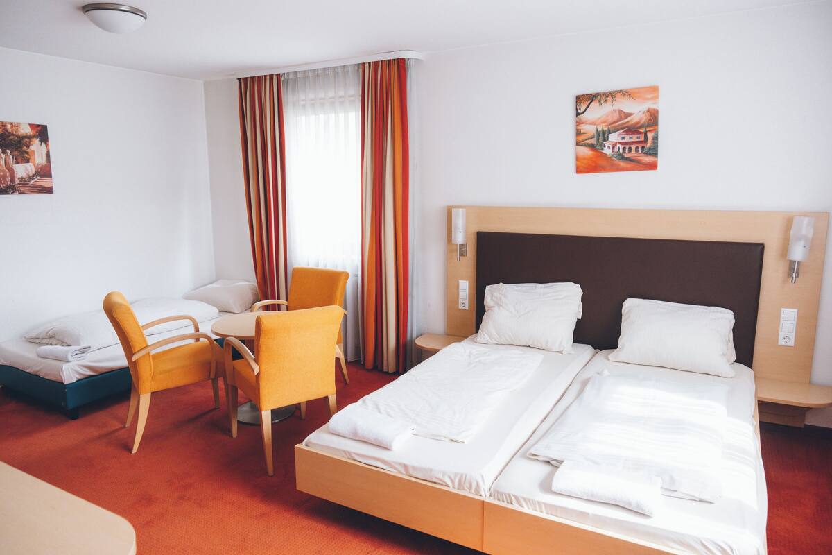 Family Quadruple Room, City View | Desk, laptop workspace, free WiFi
