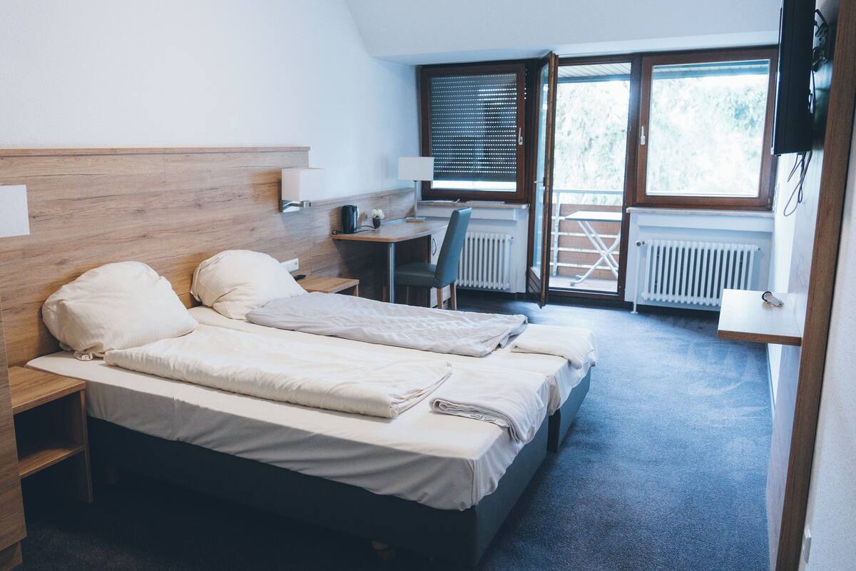 Deluxe Double Room, City View | Desk, laptop workspace, free WiFi