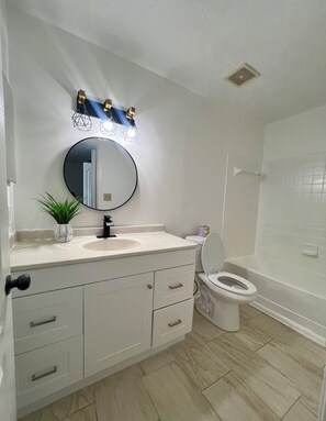 Hair dryer, towels, soap, toilet paper