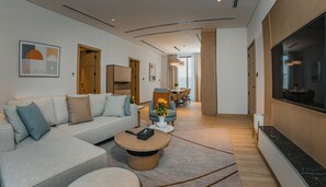 Villa, 2 Bedrooms, Private Pool | Living area | 50-inch LED TV with satellite channels - First Grand Hotel (Dammam)