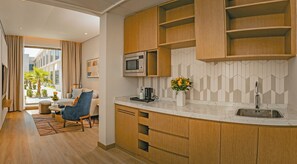 Suíte estúdio júnior, 1 cama King | Cozinha compartilhada