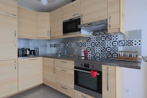 Apartment | Private kitchen | Fridge, microwave, oven, stovetop