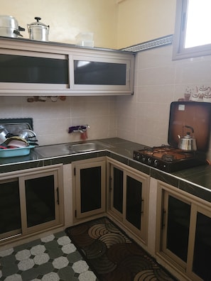 Comfort Penthouse, Balcony, River View | Private kitchen | Full-sized fridge, microwave, oven, stovetop