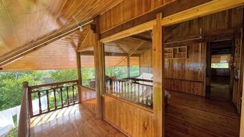 Comfort Triple Room, Garden View | Memory foam beds, desk, laptop workspace, blackout drapes