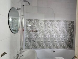 Shower, towels, toilet paper