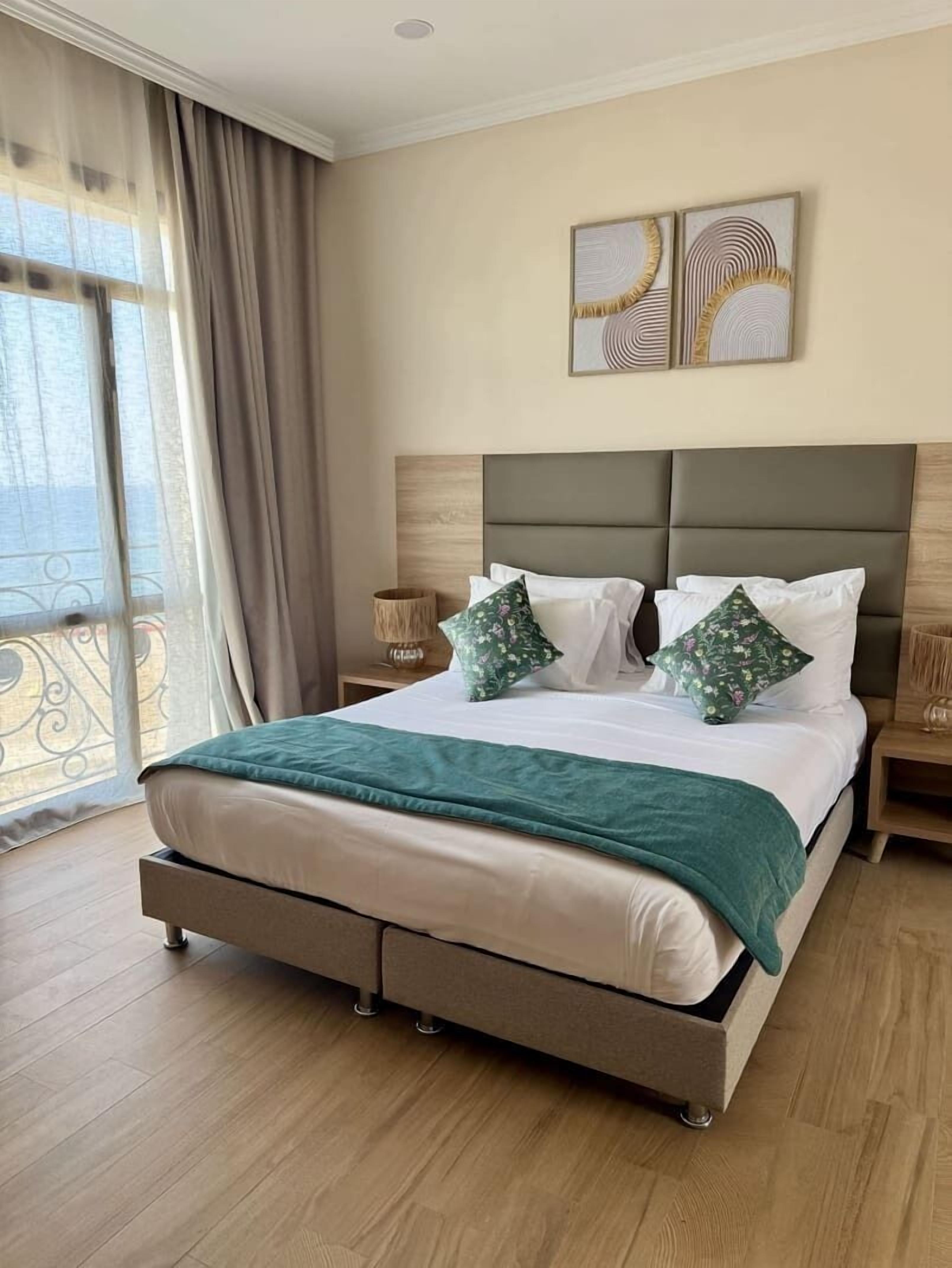 Family Room, Balcony | In-room safe, desk, laptop workspace, blackout curtains