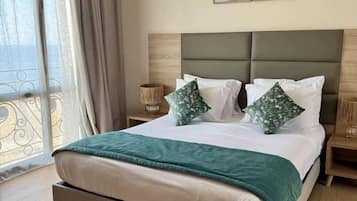 Family Room, Balcony | In-room safe, desk, laptop workspace, blackout curtains