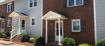 Comfortable 2-bedroom townhome in fantastic Greensboro with WiFi, AC & Big Tvs