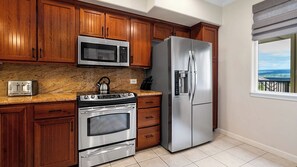 Condo, Multiple Beds, Lanai, Golf View (Waikoloa Beach Villas O22) | Private kitchen | Dining tables