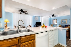 Condo, Multiple Beds, Lanai, Partial Ocean View (White Sands Village 210) | Private kitchen | Full-size fridge, microwave, oven, stovetop