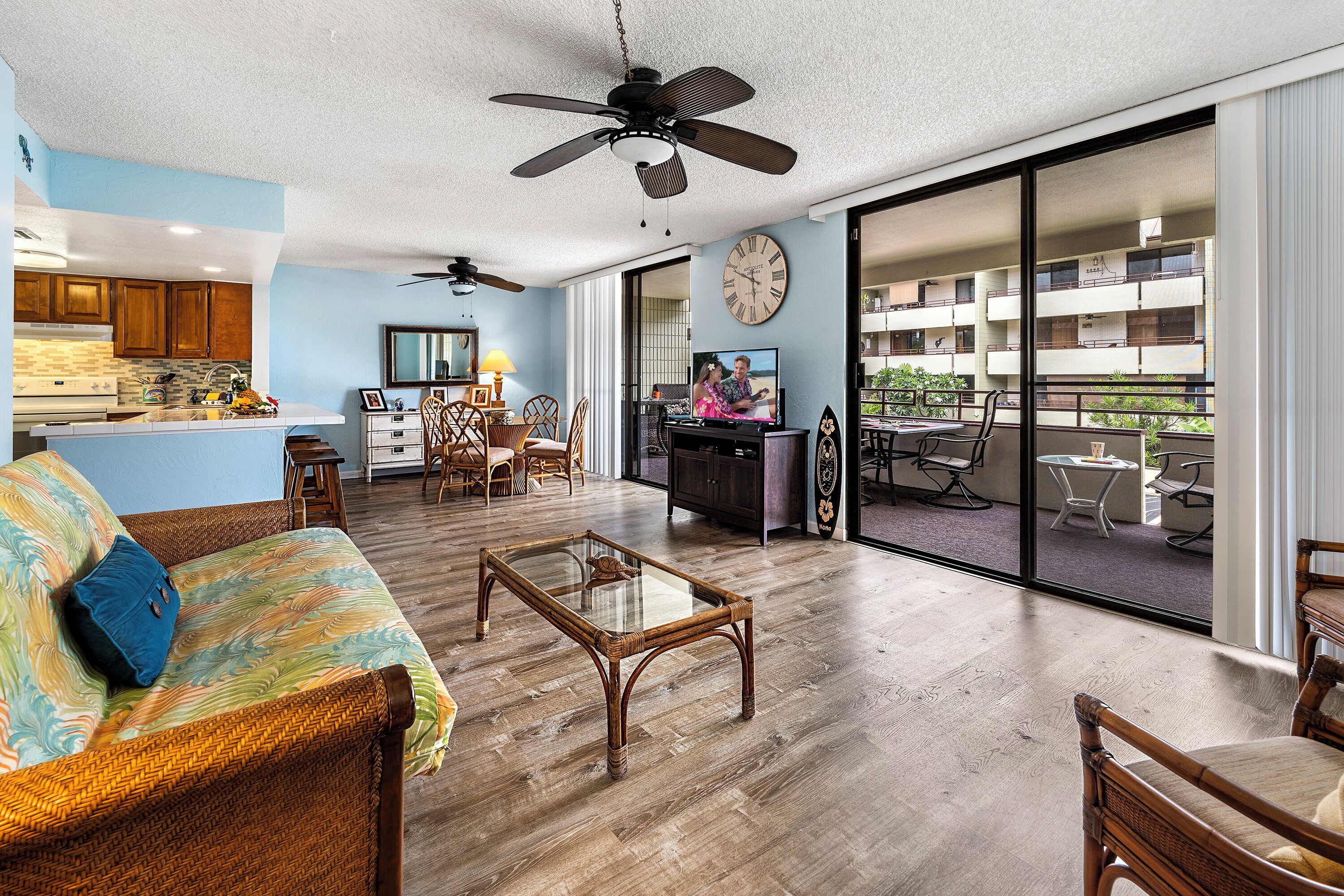 Condo, Multiple Beds, Lanai, Partial Ocean View (White Sands Village 210) | Living area | 42-inch flat-screen TV with digital channels