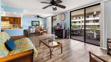 Condo, Multiple Beds, Lanai, Partial Ocean View (White Sands Village 210) | Living area | 42-inch flat-screen TV with digital channels