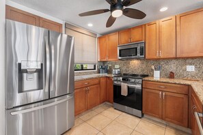 Condo, Multiple Beds, Lanai, Ocean View (Country Club Villas 332) | Private kitchen | Dining tables