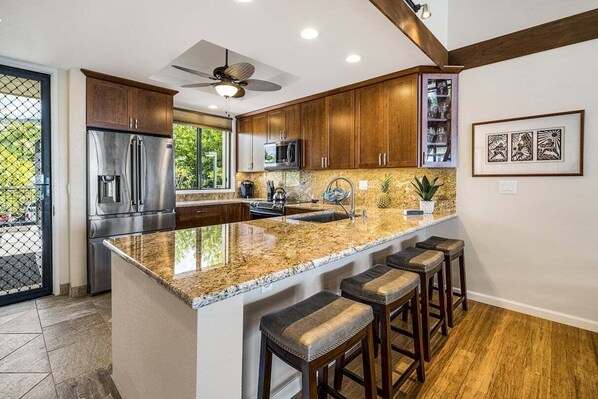 Condo, Multiple Beds, Lanai, Ocean View (Country Club Villas 318) | Private kitchen | Coffee/tea maker, dining tables - Ocean and Golf Course Views - Top Floor -vrkcv (Kailua-Kona)