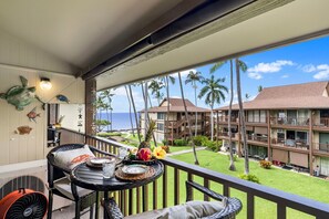 Condo, 1 Queen Bed with Sofa bed, Lanai, Partial Ocean View (Kona Isle C35) | Outdoor dining - AC - Ocean View With Lanai - Concierge Included - Vrkcv (Kailua-Kona)
