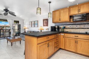 Condo, 1 Queen Bed with Sofa bed, Lanai, Partial Ocean View (Kona Isle C35) | Private kitchen | Dining tables