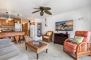 Condo, 1 Queen Bed with Sofa bed, Lanai, Partial Ocean View (Kona Isle C35) | Living area | 42-inch flat-screen TV with digital channels - AC - Ocean View With Lanai - Concierge Included - Vrkcv (Kailua-Kona)