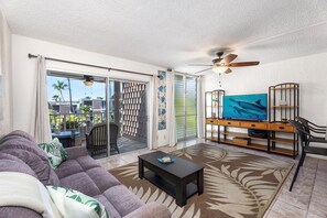 Condo, 1 Queen Bed, Lanai, Partial Ocean View (Alii Villas 319) | Living area | 42-inch flat-screen TV with digital channels