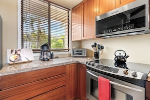 Condo, Plusieurs lits, lanai, vue sur lâocĂ©an (Country Club Villas 324) | Cuisine privĂ©e | CafetiĂšre-thĂ©iĂšre, table de salle Ă manger