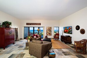 Villa, Multiple Beds, Lanai, Ocean View (Royal Sea Cliff 109) | Living area | 65-inch flat-screen TV with digital channels - Ocean Front Villa - Central AC- Vrkcv (Kailua-Kona)